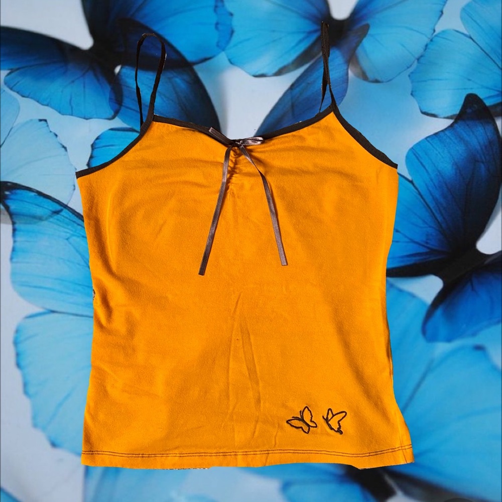 Orange with brown detailing and butterflies babyte